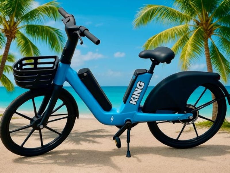 Blue electric bike parked on a beach
