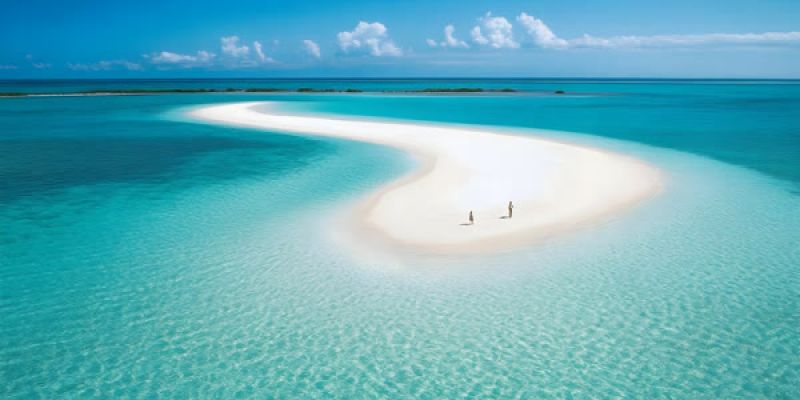 Pristine white sandbar in turquoise shallow water