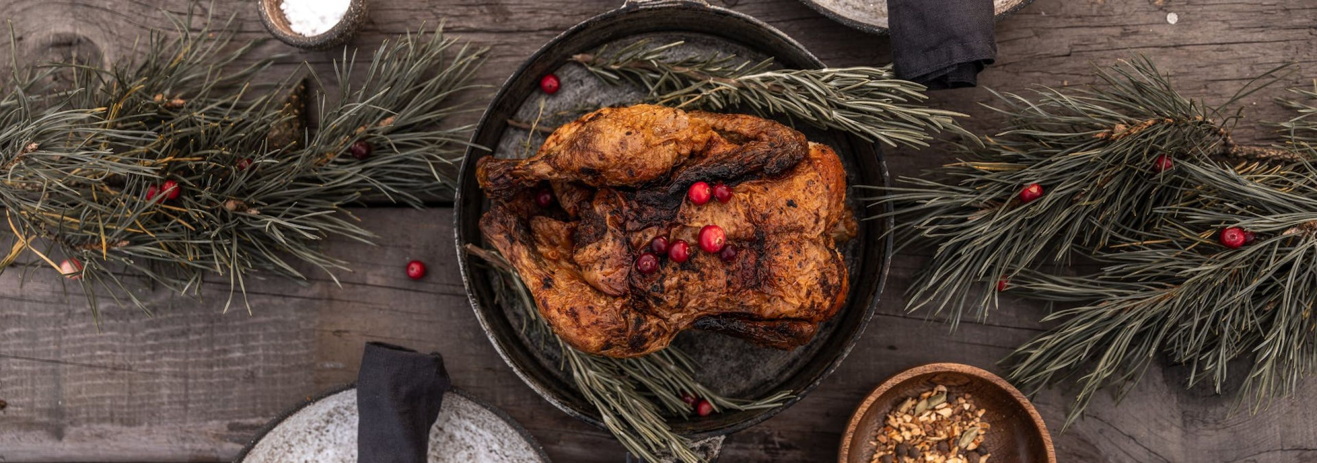 Overhead food styling with roasted chicken and plating