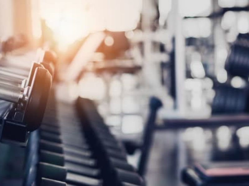 Modern gym equipment in bright fitness facility