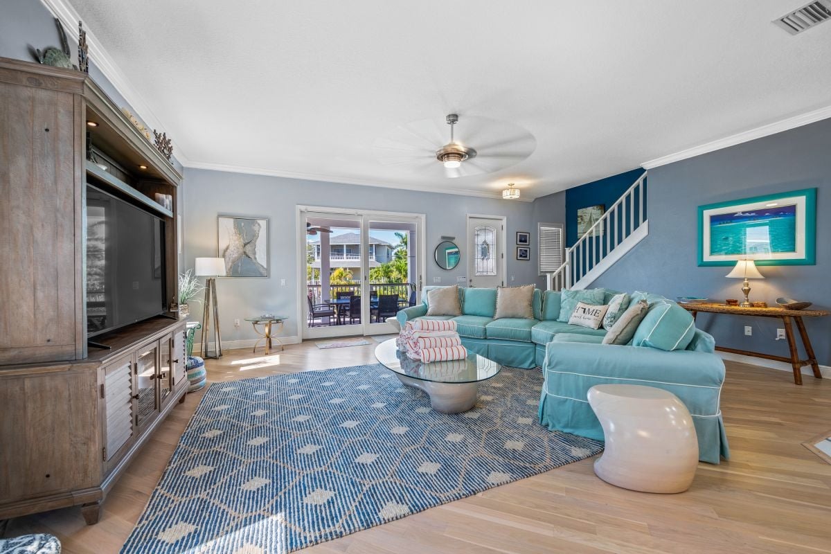 Modern bright living room with teal and turquoise coastal decor